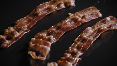 Fried-Bacon-Strips-For-Breakfast.-close-up,-zoom-in