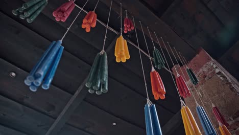 Colorful-candles-hanging-on-string-in-Guatemala