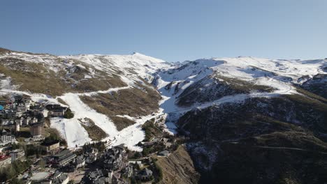 Panoramic-aerial-view-over-popular-Spanish-ski-resort,-Granada