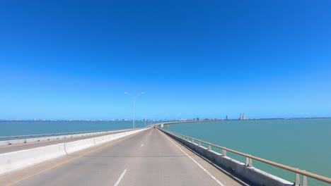 POV-Driving-on-the-Queen-Isabella-Causeway-toward-South-Padre-Island-from-Port-Isabel-in-southern-Texas