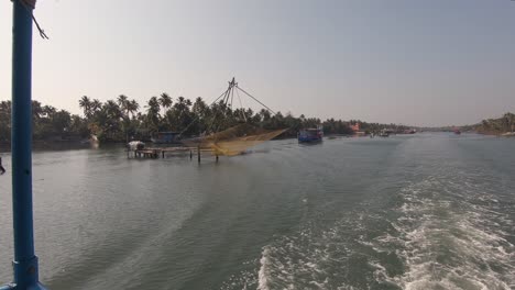 Alappuzha-district,-traditional-waterway,-view-from-a-boat-navigate-on-river,-Kerala