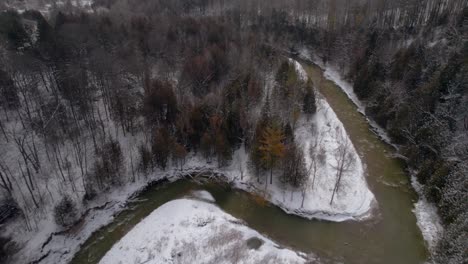 Fly-Over-of-Frozen-Winter-Landscape-with-Snowy-Coniferous-Trees