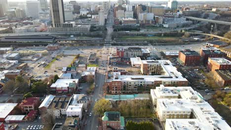 Shockoe-Bottom,-Main-Street-Station,-and-Downtown-Richmond,-Virginia-|-Aerial-View-Panning-Up-|-Winter-2022