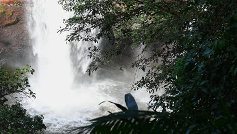 Lovely-white-water-falling-from-Heo-Suwat-Waterfalls,-Khao-Yai-National-Park,-Thailand