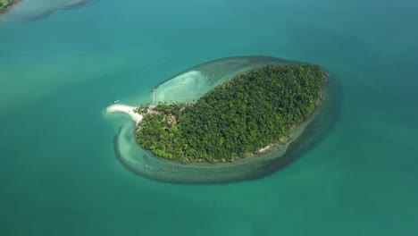 Aerial-far-away-drone-small-tropical-private-island