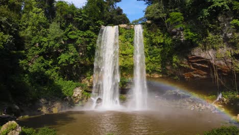 Beautiful-tropical-waterfall-in-rainforest-with-rainbow,-aerial-4K-view---Misol-Ha-Waterfalll,-Chiapas,-Mexico