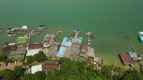 Aerial-drone-of-Salek-Phet-fishing-village-in-Koh-Chang-mountains-and-ocean