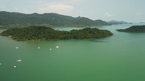 Aerial-pan-left-wide-shot-of-tropical-islands-in-Thailand