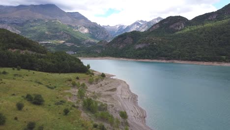 Lake-Embalse-de-Bubal-at-Valle-de-Tena-in-Huesca,-Aragon,-Spanish-Pyrenees,-Spain---Aerial-Drone-View-of-Water-Reservoir