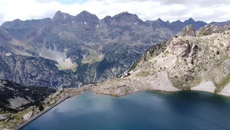 Brazato-Lake-at-the-Spanish-Pyrenees-at-Panticosa,-Huesca,-Aragon,-Spain---Aerial-Drone-View