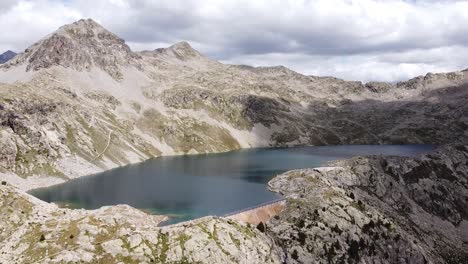 Brazato-Lake-at-Spanish-Pyrenees-in-Panticosa,-Huesca,-Aragon,-Spain---Aerial-Drone-View