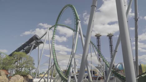 Epic-footage-of-a-roller-coaster-being-shot-out-of-a-tunnel-into-a-series-of-loops-and-twists