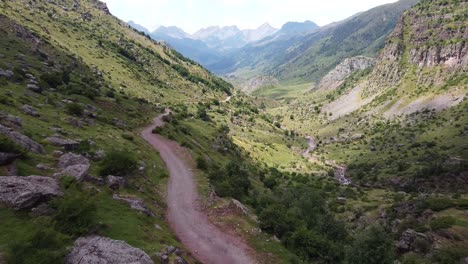 Spanish-Pyrenees,-Spain---Aerial-Drone-View-of-the-Hiking-Trail-and-Green-Valley-of-Valle-de-Aguas-Tuertas