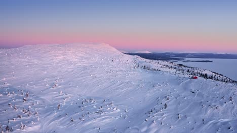 Snow-Covered-Mountain-Peak-In-Scandinavia-At-Evening-Dawn