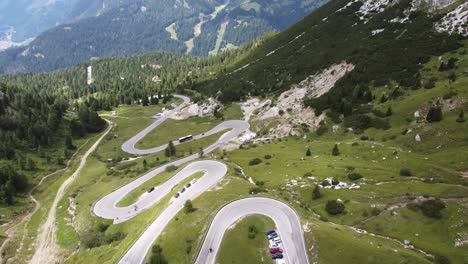 Pordoi-Mountain-Pass-at-Trentino,-South-Tyrol,-Dolomites,-Italy---Aerial-Drone-View-of-Hairpin-Curves-and-Mountains