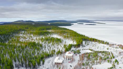Aerial-View-Of-Scenic-Winter-Landscape-Near-Small-Finnish-Village