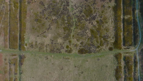 CAWTHORNE-ROMAN-CAMP,-Pickering-,-Aerial-Footage,-North-York-moors-National-Park,-Reverse-90-degree-top-down-traverse-of-roman-fort-earthworks-Mavic-3-Cine-Prores-4k-March-2022---Clip-6