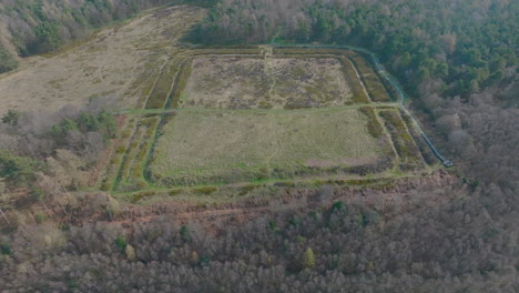 CAWTHORNE-Roman-Camp,-Pickering-,-Aerial-Footage,-North-York-moors-National-Park,-Pull-back-from-roman-camp-earthworks