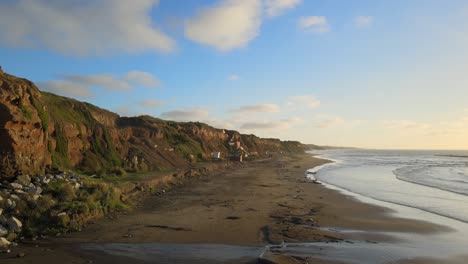 Emerging-from-the-cliffs-beach,-Mar-del-Plata,-Argentina