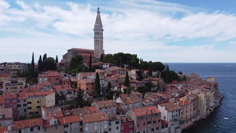 Rovinj-at-Istria,-Croatia---Aerial-Drone-View-of-the-Old-Town-with-Colorful-Houses-and-Church-Tower