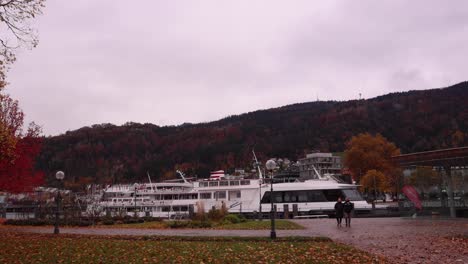Bregenz-lake-promenade-in-autumn---Lake-Constance-Boat---rainy-day