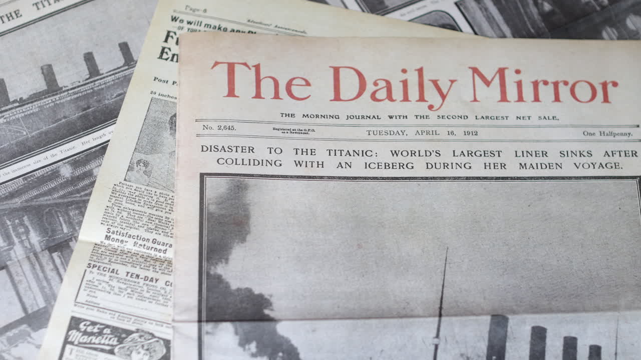 Premium stock video - Daily mail newspaper front page headlines after the  sinking of the titanic ship in 1912