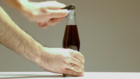 Slow-motion-open-a-cola-bottle-4k