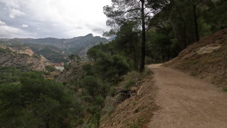4k-Shot-of-a-dirt-walkway-at-El-Caminito-del-Rey-in-Gorge-Chorro,-Malaga-province,-Spain
