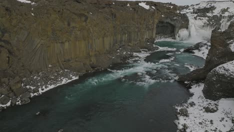 Basalt-Column-River-Cliffs-by-Aldeyjarfoss-Waterfall-in-Iceland---Aerial