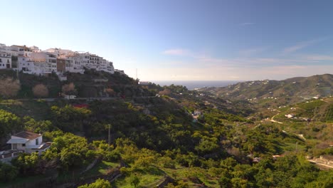 Panoramic-pan-across-typical-Spanish-valley-with-white-washed-village