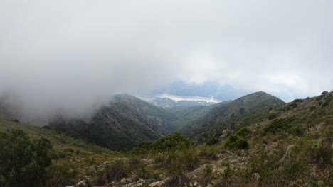 4k-Wide-shot-of-mountains-and-clouds-from-the-mountain-La-Concha,-Marbella,-Spain