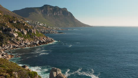 Rocky-Coastline-Of-Llandudno-Hit-By-Ocean-Waves-In-Cape-Town,-South-Africa