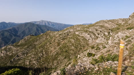 4k-Moving-shot-of-beautiful-mountains-and-hiking-sign-at-La-Concha,-Marbella,-Spain