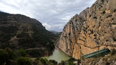 4k-Wide-shot-of-the-end-of-the-hike-at-El-Caminito-del-Rey-in-Gorge-Chorro,-Malaga-province,-Spain