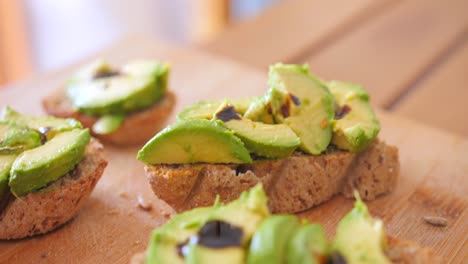Close-up-view-of-breakfast-sandwich-of-homemade-bread-with-sliced-Avocado