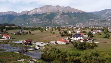 Gusinje-Valley-and-Ali-Pasha-Springs-near-Prokletije-National-Park,-Montenegro---Aerial-Circling-Pan