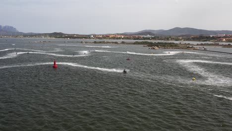 overview-from-the-air-on-the-water-of-the-jet-ski-world-cup-with-the-fast-water-bikes-that-practice