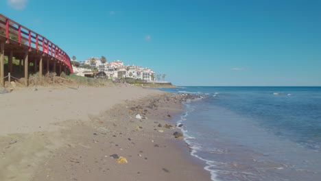 Moving-backwards-at-the-beach-of-Calahonda,-Costa-del-Sol
