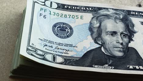 Andrew-Jackson-in-20-dollar-bills-USDs-flipping-into-frame-4k