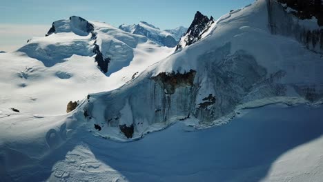 mountain-summit-in-the-swiss-alps,-Saas-Fee,-blue-sky,-breathtaking-view