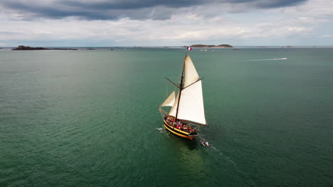 Le-Renard-wooden-corsair-vessel-sailing-along-Saint-Malo-coast,-France