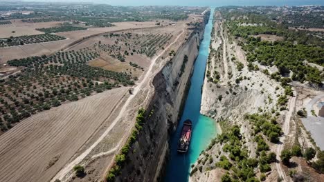 View-of-a-boat-in-the-Corinth-canal,-Greece