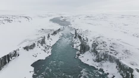Picturesque-Dettifoss-Waterfall-of-Iceland-during-Snowy-Winter,-Aerial