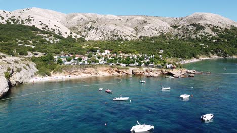 Krk-Island,-Croatia---Coastline-with-Boats,-Campsite-and-Beaches-at-Kvarner-Bay,-Adriatic-Sea---Aerial-Drone-View