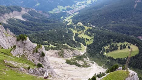 Cable-Car-to-the-top-of-Seceda-Mountain-Peak-at-Urtijei,-South-Tyrol,-Italian-Alps,-Dolomites,-Italy---Aerial-Drone-View