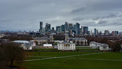 London-skyline-day-to-night-timelapse-overlooking-the-famous-Greenwich-Old-Royal-Naval-College-with-the-modern-skyline-of-Canary-Wharf-in-Docklands-behind
