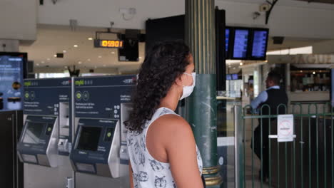 Woman-wearing-mask-during-covid19-train-station