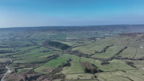 North-York-moors-near-Blakey-Ridge,-Aerial-Drone-flight-over-sunny-moors-and-dale,-push-out-over-dales