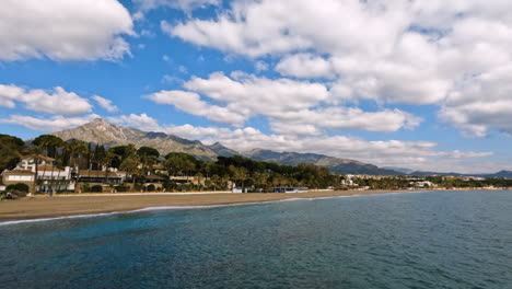 4k-Wide-shot-of-the-famous-La-Concha-mountain-and-the-beautiful-beach-at-Marbella,-Spain