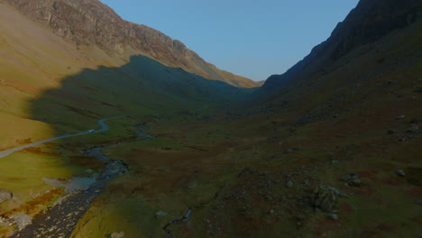 HONISTER-PASS-Lake-District-National-Park-in-afternoon-sunshine-and-shadows,-push-forward-through-valley-Mavic-3-Cine-Prores-422-March-2022---Clip-2